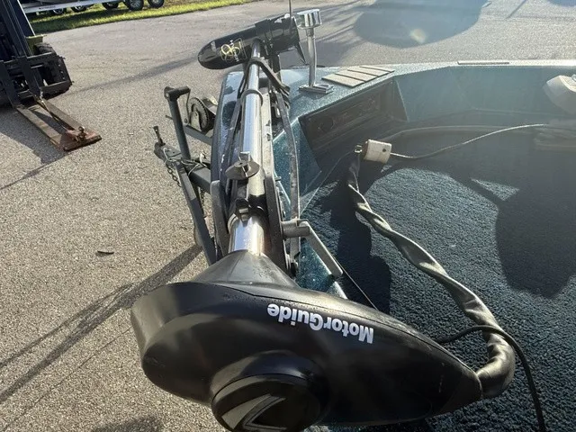 Slide: The Image of A 1985 Ranger 330-v with a MotorGuide motor on a parking lot. - 5