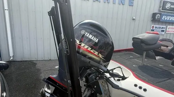 Slide: The Image of A 2007 Ranger 519 VX with a Yamaha engine, parked in an outdoor area. - 4