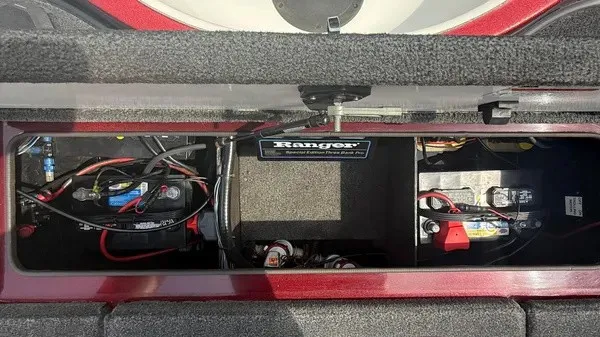 Slide: The Image of A view of the battery compartment in a 2007 Ranger 519 VX boat with two batteries. - 15