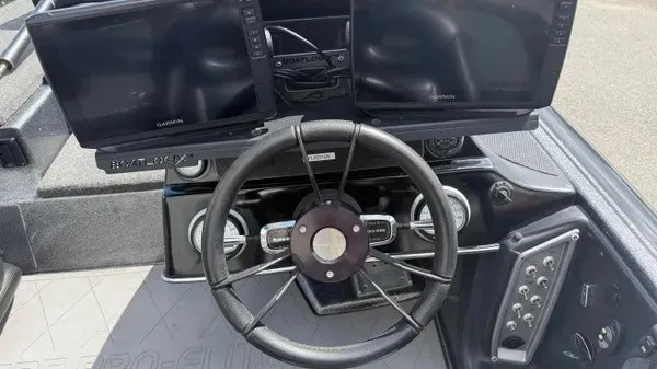 Slide: The Image of The image shows the cockpit of a 2020 Blazer 625 Pro Elite boat with two screens. - 11