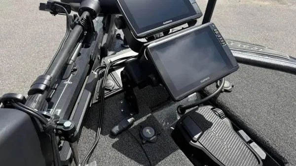 Slide: The Image of The image shows the cockpit of a Blazer 625 Pro Elite boat with two Garmin screens. - 10