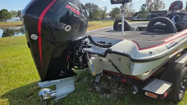 Slide: The Image of A 2021 Triton 20 TrX boat with a Mercury 250 HP outboard motor, on a trailer. - 10