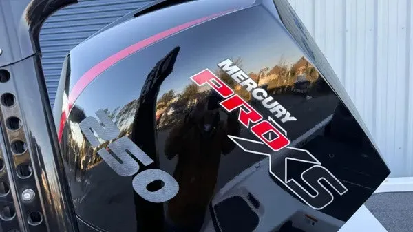 Slide: The Image of Close-up of a Mercury Pro XS 250 outboard motor on a Caymas CX 20 PRO boat. - 13