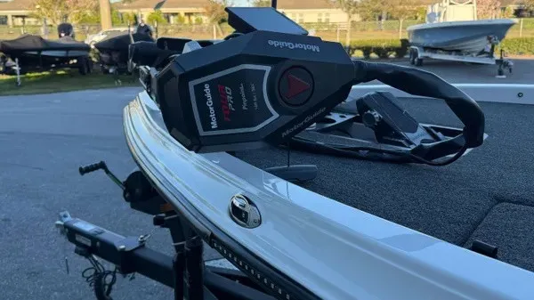 Slide: The Image of A 2022 Caymas CX 20 PRO with a MotorGuide trolling motor on a trailer. - 8