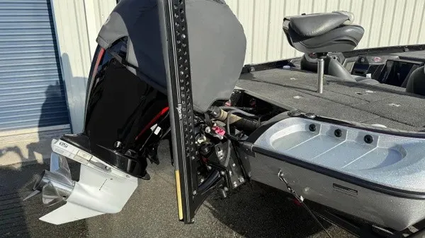 Slide: The Image of A 2015 Ranger Z118 Comanche with a powerful outboard motor and spacious deck. - 5