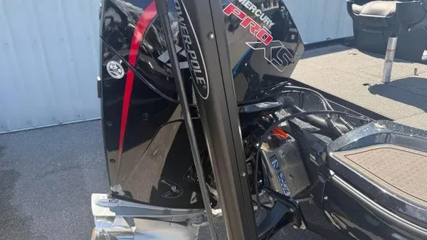 Slide: The Image of A 2022 Nitro Z18 boat with a Mercury Pro XS engine, mounted on a trailer. - 4