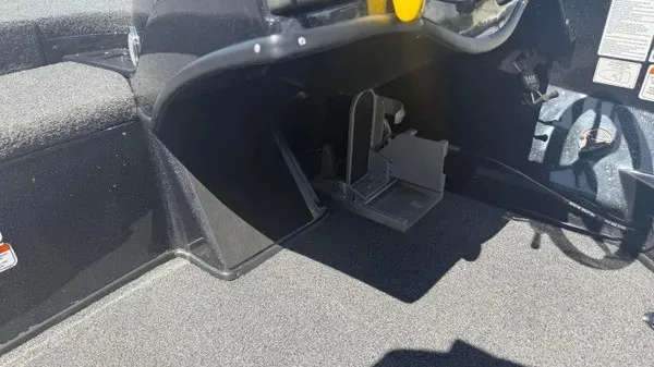Slide: The Image of Close-up of the helm area of a 2022 Nitro Z18 boat, featuring pedals and controls. - 14