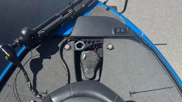 Slide: The Image of The image shows the cockpit of a blue 2022 Nitro Z18 boat with controls and instruments. - 12