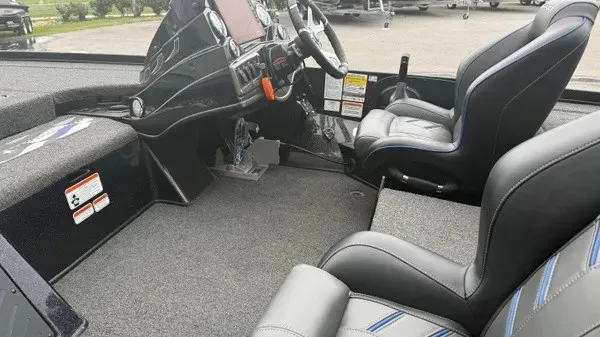 Slide: The Image of The image shows the cockpit of a 2022 Nitro Z18 boat with modern seats and instruments. - 9