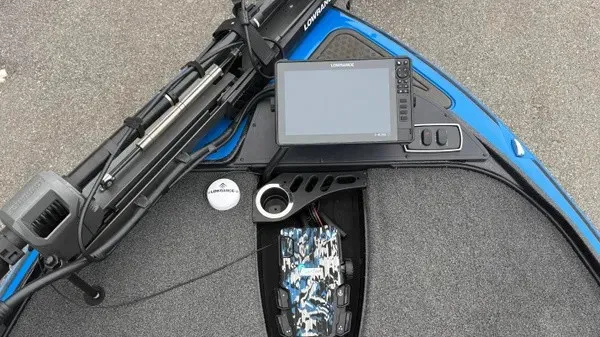 Slide: The Image of The image shows the cockpit of a 2022 Nitro Z18 boat with a Lowrance fish finder. - 11