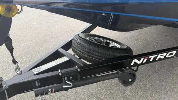 Slide: The Image of A Nitro Z18 boat trailer with a spare tire underneath. - 10