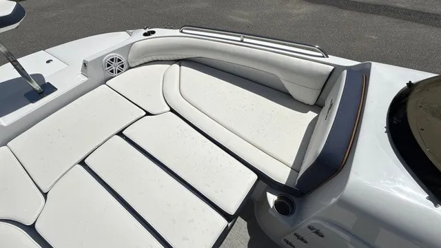 Slide: The Image of The image shows the white upholstery of a 2027 Stingray 192 SC with a speaker. - 8