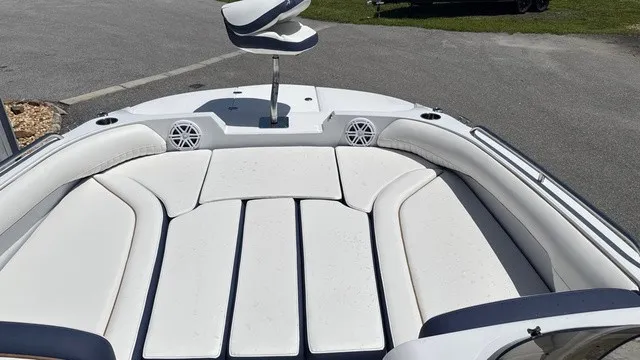 Slide: The Image of The image shows the bow area of a Stingray 192 SC boat with white upholstery. - 6