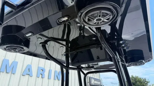 Slide: The Image of The image shows the black T-top of a Blazer PureBay 2400 with speakers and lighting. - 11