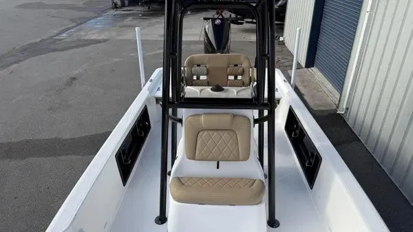 Slide: The Image of The image shows the deck of a 2026 Blazer PureBay 2400 with beige seating. - 20