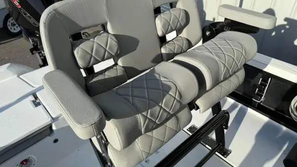 Slide: The Image of Gray padded boat seats with quilted pattern on a Blazer PureBay 2200. - 18
