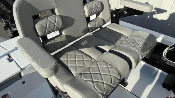 Slide: The Image of The 2026 Blazer PureBay 2200 features a luxurious, padded bench seat with a quilted design. - 19