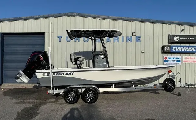 The Image of 2026 Blazer PureBay 2200 on a trailer in front of a building. - 1