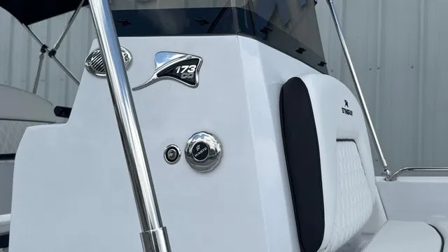 Slide: The Image of Close-up of a Stingray 173 CC boat's helm with polished metal accents. - 2