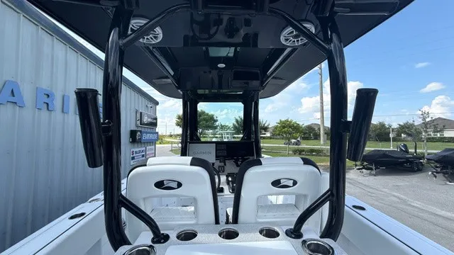 Slide: The Image of The image shows the cockpit of a 2027 Stingray 253 CC boat with modern seating and controls. - 16