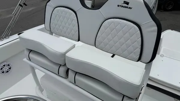 Slide: The Image of The 2027 Stingray 206 CC features cushioned seats with a quilted pattern and sleek design. - 11