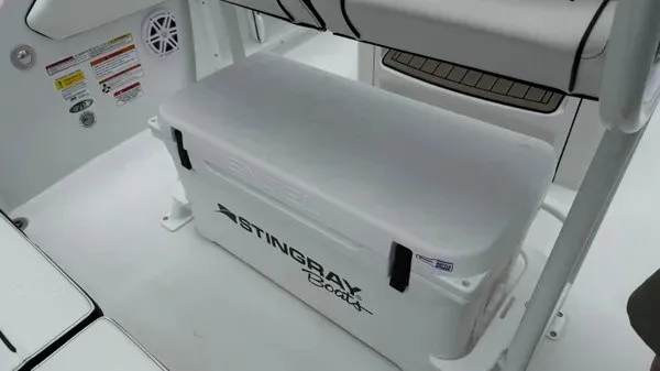 Slide: The Image of The image shows a white cooler labeled "Stingray 206 CC" on a boat. - 21