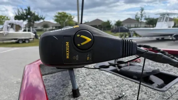 Slide: The Image of Close-up of a Minn Kota Maxxum trolling motor on a Tracker boat. - 9