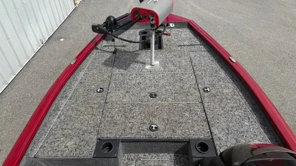 Slide: The Image of The image shows the deck of a 2023 Tracker Pro Team 195 TXW Tournament Edition boat. - 12