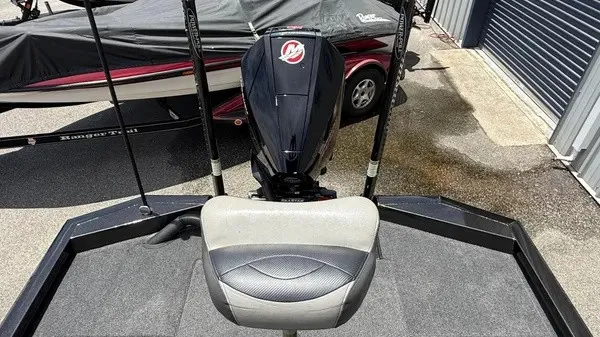 Slide: The Image of A 2019 Vexus AVX 2080 with a Mercury outboard motor, parked on a trailer. - 10
