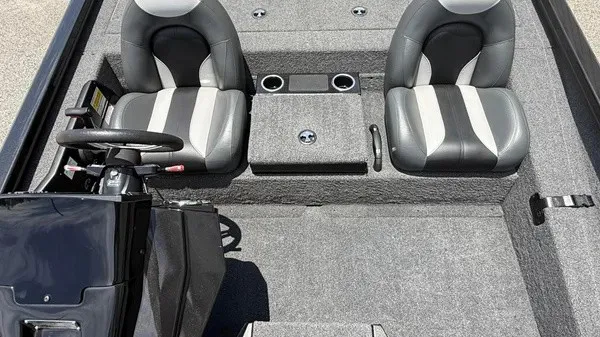 Slide: The Image of The image shows the cockpit of a 2019 Vexus AVX 2080 boat with two cushioned seats. - 9