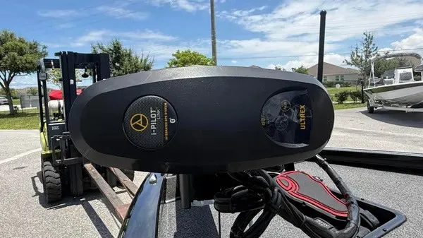 Slide: The Image of A 2019 Vexus AVX 2080 boat with an i-Pilot Ulterra motor, parked on a trailer. - 6