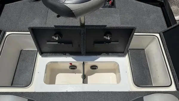 Slide: The Image of The image shows the interior of a 2019 Vexus AVX 2080 boat with two open storage compartments. - 15