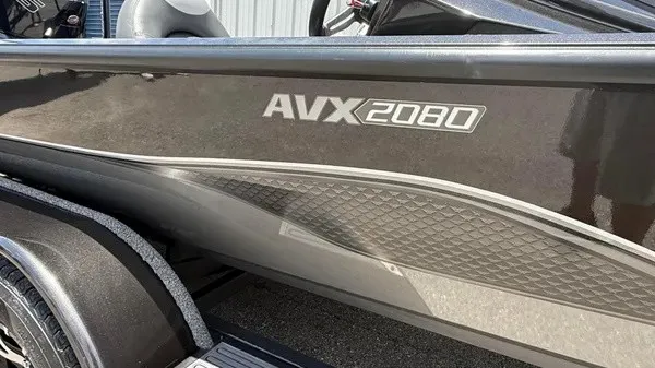 Slide: The Image of Close-up of a 2019 Vexus AVX 2080 boat side with sleek design. - 2