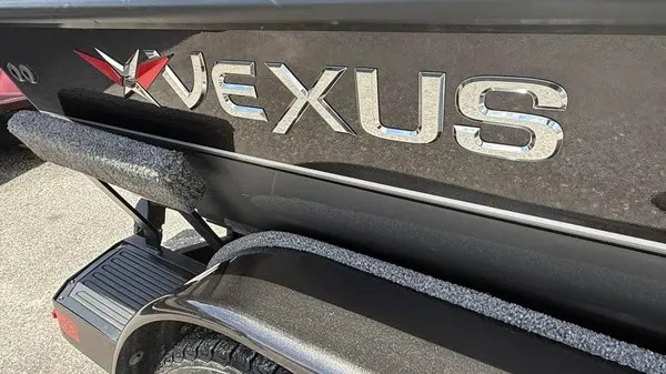 Slide: The Image of Close-up of the 2019 Vexus AVX 2080, showing the logo and part of the trailer. - 3