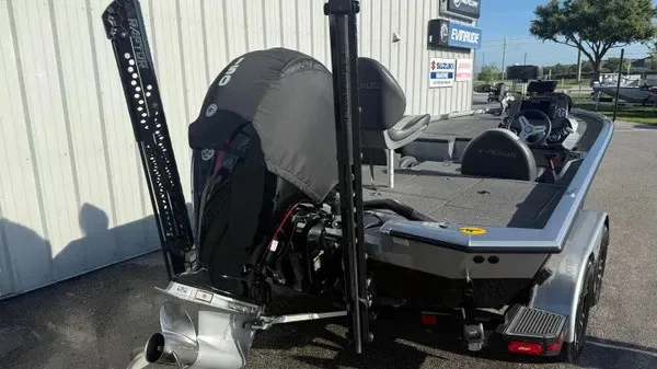 Slide: The Image of The image shows a 2024 Vexus AVX 1980 boat with an outboard motor. - 3