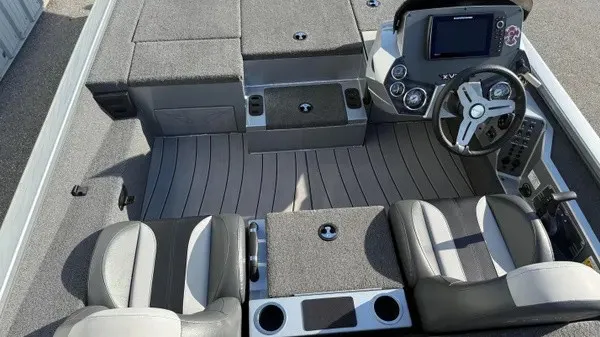 Slide: The Image of The image shows the cockpit of a 2024 Vexus AVX 1980 boat with two seats and a helm. - 11