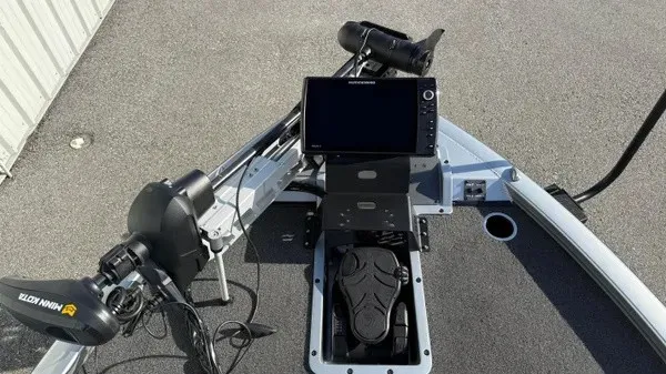 Slide: The Image of The image shows the cockpit of a 2024 Vexus AVX 1980 boat with a modern control system. - 14