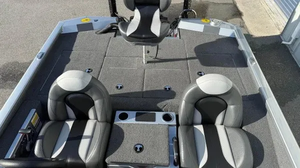 Slide: The Image of The image shows the cockpit of a 2024 Vexus AVX 1980 with three padded seats. - 9