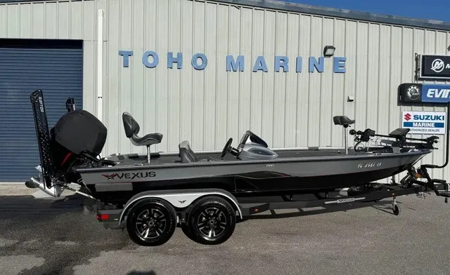 The Image of A gray 2024 Vexus AVX 1980 boat on a trailer in front of a building. - 1