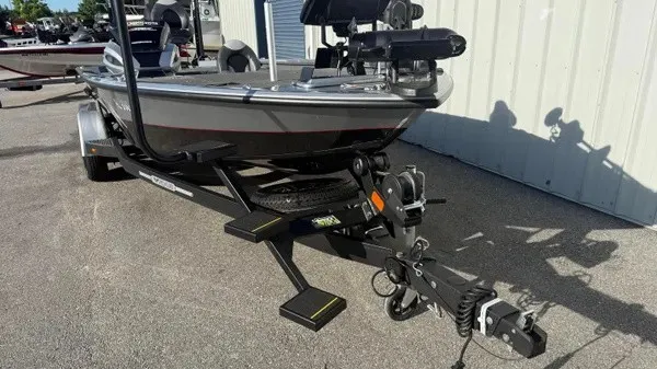 Slide: The Image of A 2024 Vexus AVX 1980 boat on a trailer, ready for transport. - 8