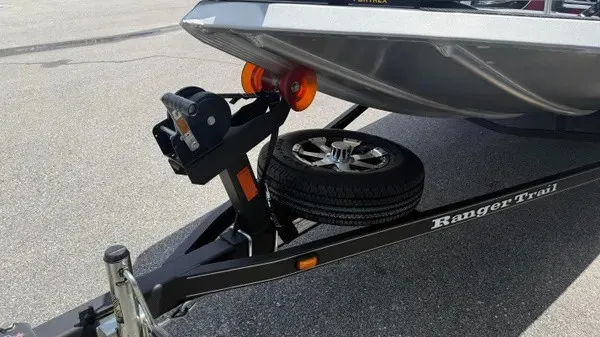 Slide: The Image of A Ranger RT188 boat on a trailer with a spare tire and winch. - 7