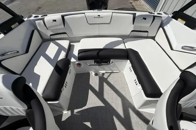 Slide: The Image of Interior view of a 2027 Stingray 20 SBX with stylish white and black seating. - 16