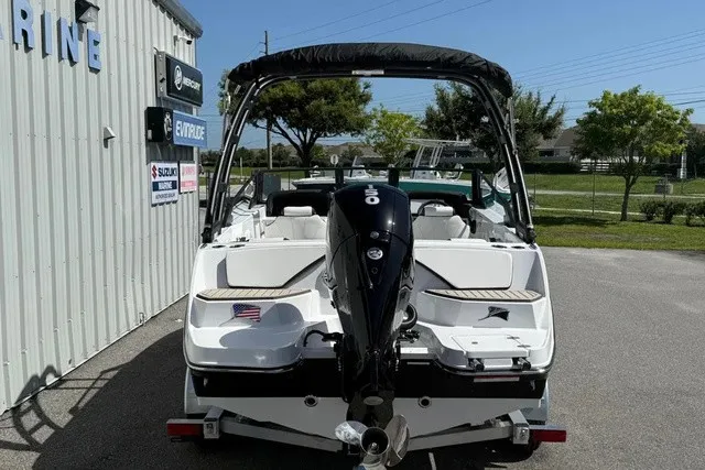 Slide: The Image of A 2027 Stingray 20 SBX boat is parked, featuring an outboard motor and a sleek design. - 24
