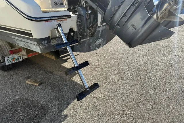 Slide: The Image of A telescopic ladder is mounted at the stern of a Pursuit OS 335 Offshore boat. - 9