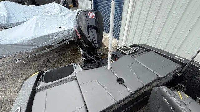 Slide: The Image of The image shows the rear of a 2022 Nitro ZV19 boat with an outboard motor. - 9