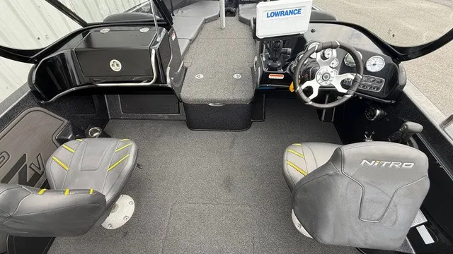 Slide: The Image of The image shows the cockpit of a 2022 Nitro ZV19 boat with two seats and a helm. - 10