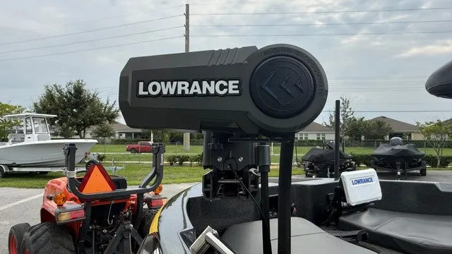 Slide: The Image of A Lowrance fish finder is mounted on a 2022 Nitro ZV19 boat. - 6