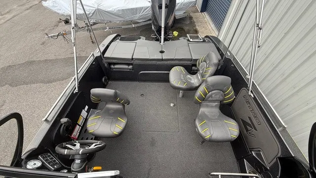 Slide: The Image of The image shows the cockpit of a 2022 Nitro ZV19 boat with gray seats. - 8