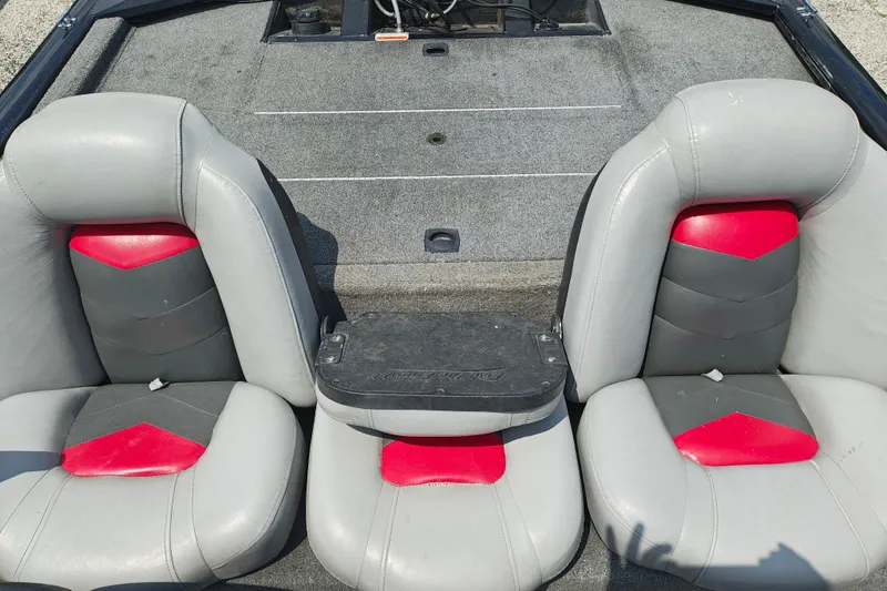 Slide: The Image of 2016 Tracker Pro Team 175 TXW boat seats with red and gray upholstery. - 15