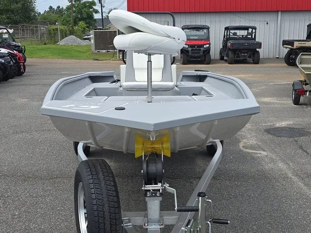 Slide: The Image of A 2026 G3 Bay 17 boat on a trailer, featuring an elevated seat at the front. - 4